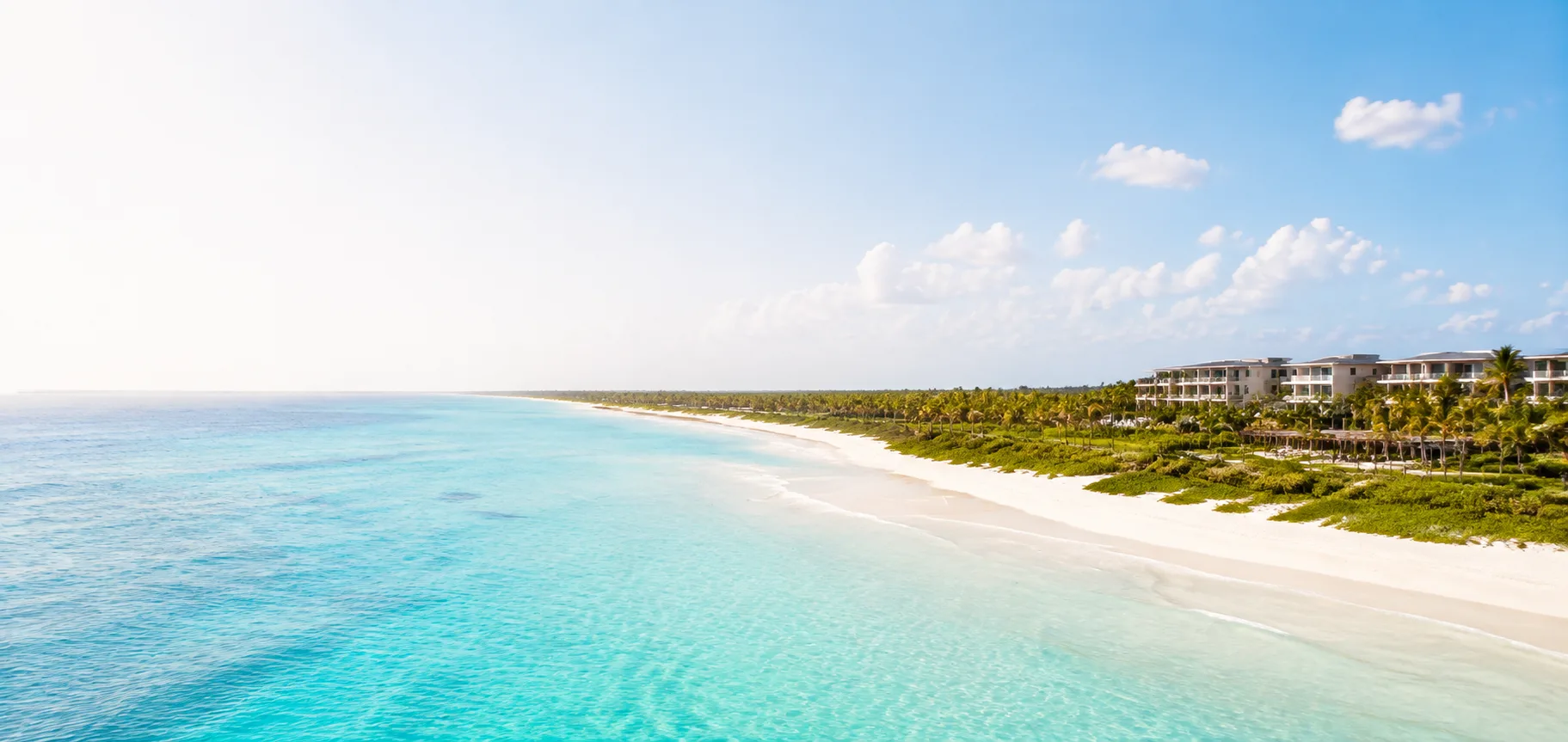 Playa Mujeres white-sand beach and coastal vegetation